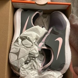 Girls 2Y brand new Nike sneakers slip on.